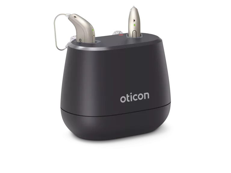 Oticon_Charger_H1-2024_Angled_w_miniRITE_C090_400pctSize